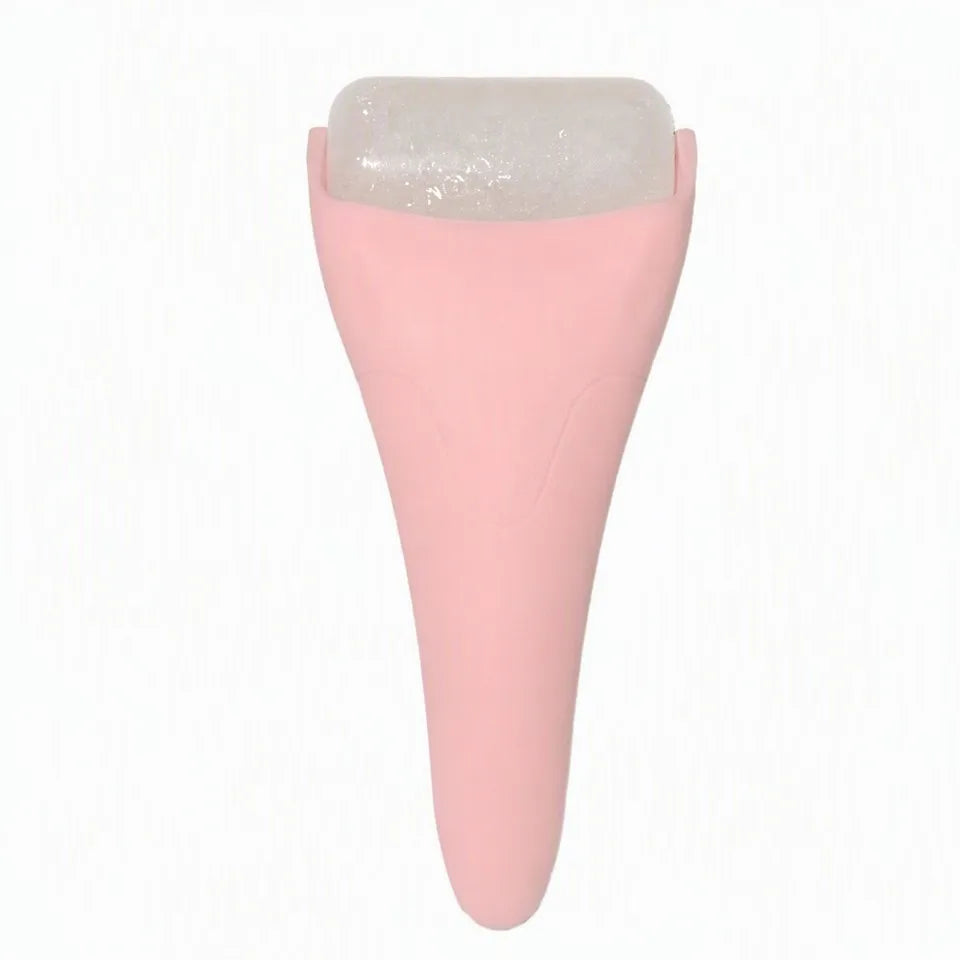 Pink ice roller facial massager on white background