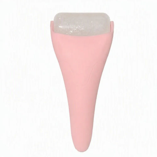 Pink ice roller facial massager on white background