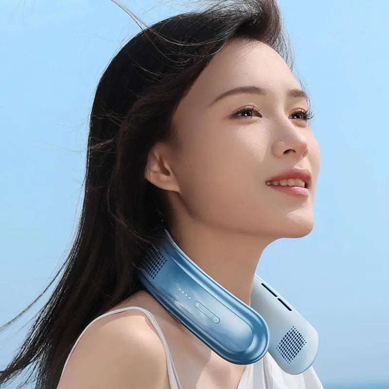 Light blue neck fan worn at the beach